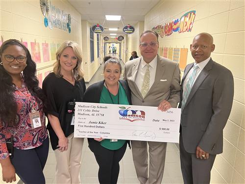 Columbia TOTY Jamie Kiker with prize patrol